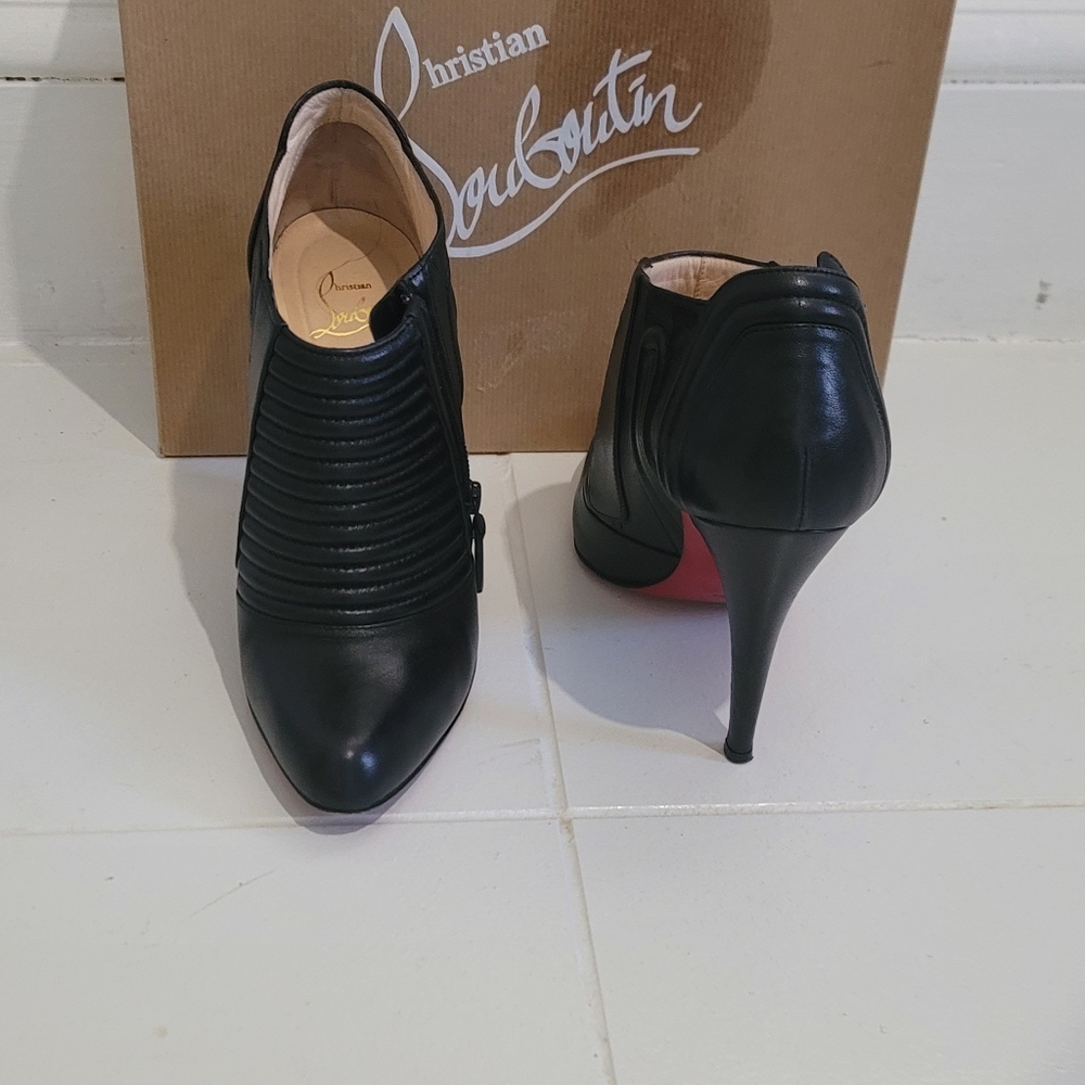 Louboutin ankle boots in good condition.